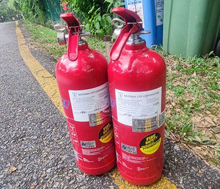 How are the different types of fires extinguished by a portable fire extinguisher?